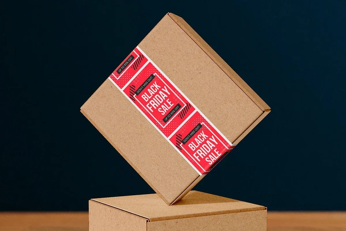 A brown shipping box sealed with custom Black Friday Sale packaging tape, ideal for promotional branding in e-commerce and retail packaging.