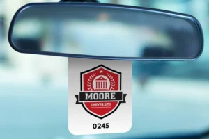 Custom hanging parking permits and a parking decal, featuring spaces for logos, barcodes, and customizable text