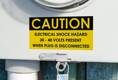 An electrical meter warning label for hazard identification.