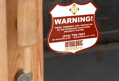 A durable door alarm warning label for security and safety notifications.